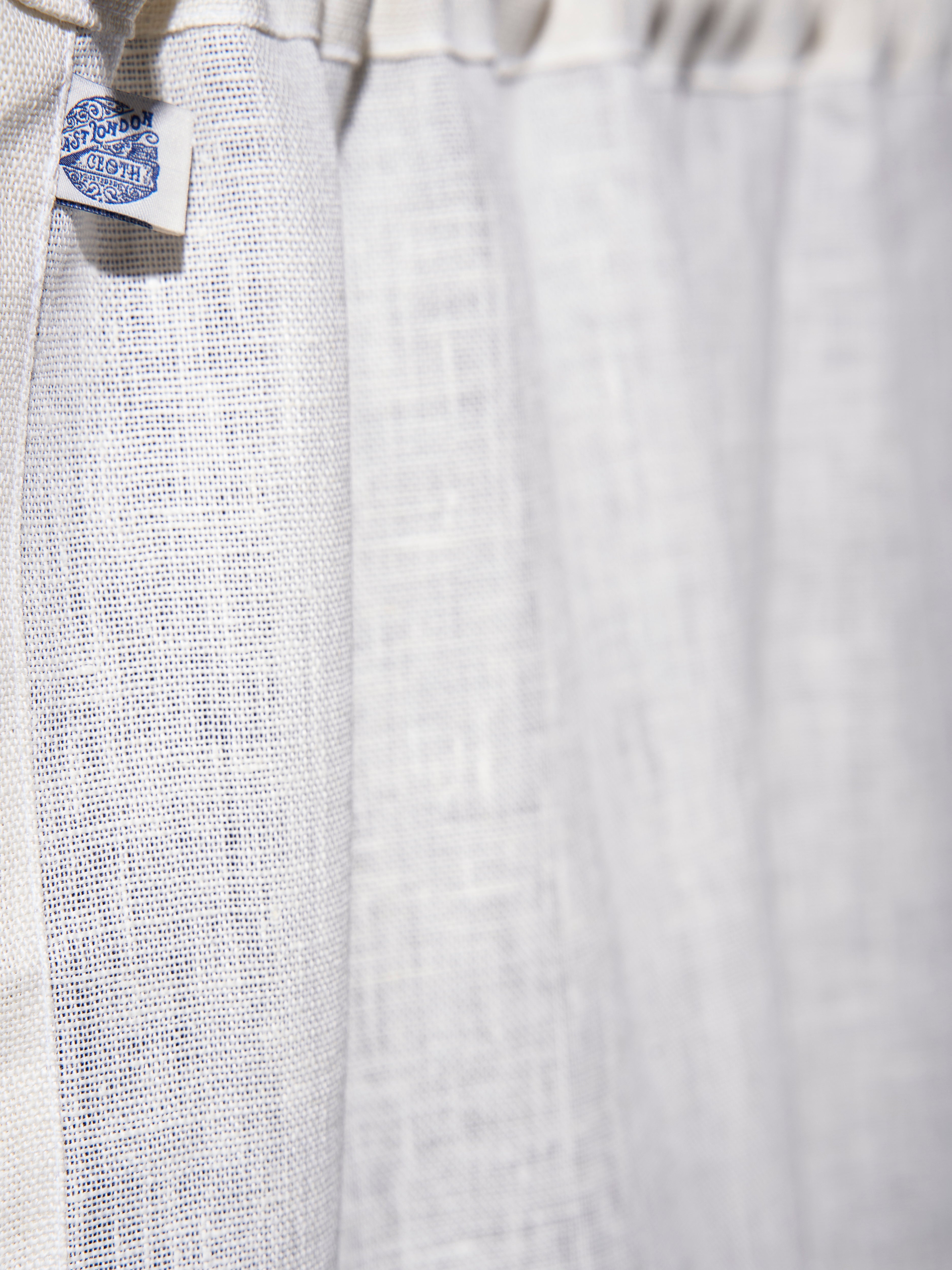 The cafe curtain - openweave linen with a pocket top